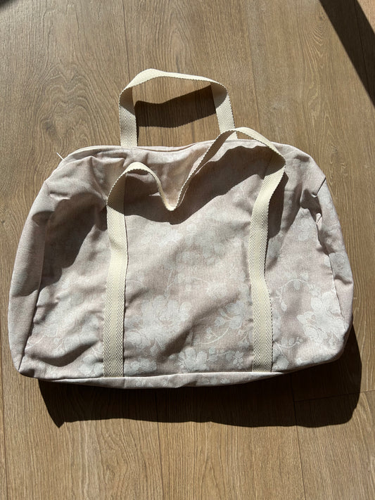Bolsa de viaje flor beige